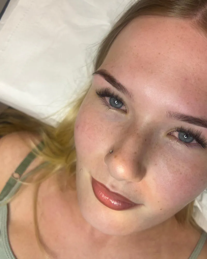 Client showing lash extensions completed by Laura at L’Aura Beauty Room