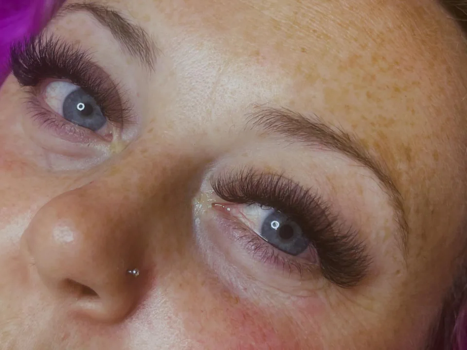 Lash extension result showing both eyes after an appointment with Laura